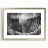 Framed wall art showcasing a stunning landscape of canyons, featuring a silver mat and frame, perfect for enhancing home decor with natural beauty.