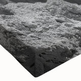 Close-up of a stretched canvas artwork showcasing a vibrant canyon landscape with rich colors and intricate textures, perfect for home decor enthusiasts.