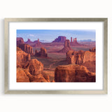 Framed wall art showcasing a stunning canyon landscape design, featuring a silver frame and mat, ideal for enhancing home decor with natural beauty.