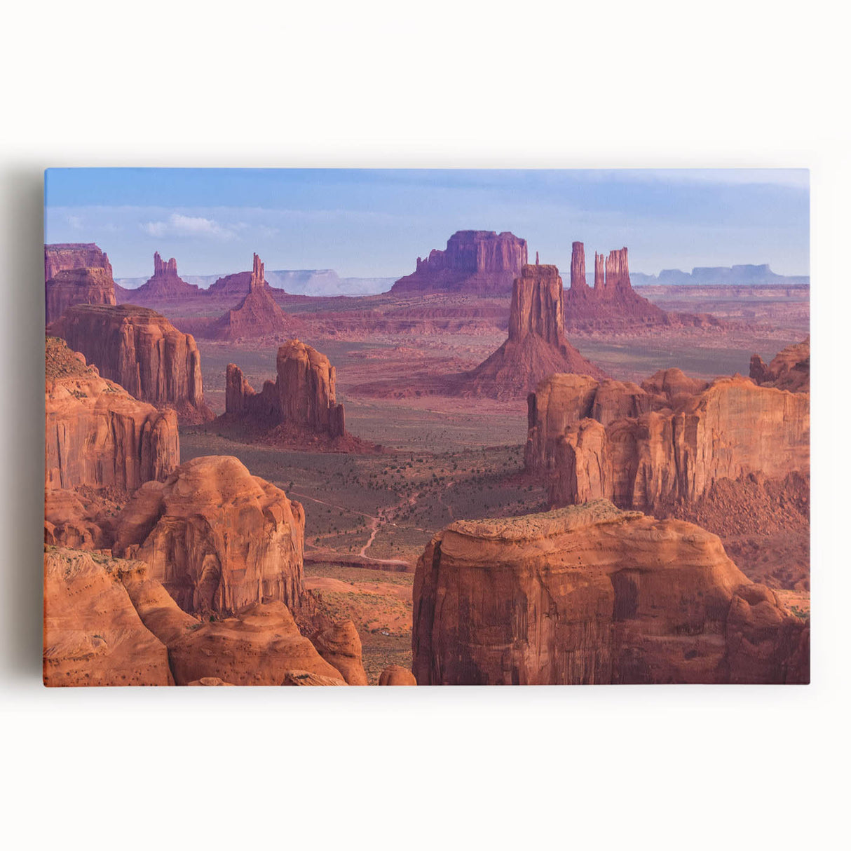 Stretched canvas wall art featuring a vibrant landscape design of canyons, showcasing rich earthy tones and dramatic textures, perfect for home decor.