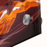 Close-up view of a stunning acrylic wall art piece showcasing vibrant canyon landscapes, highlighting intricate textures and vivid colors, perfect for modern decor.