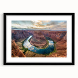 Black-framed landscape wall art featuring a canyon design with a white mat, showcasing vibrant colors and intricate details, ideal for home decor.