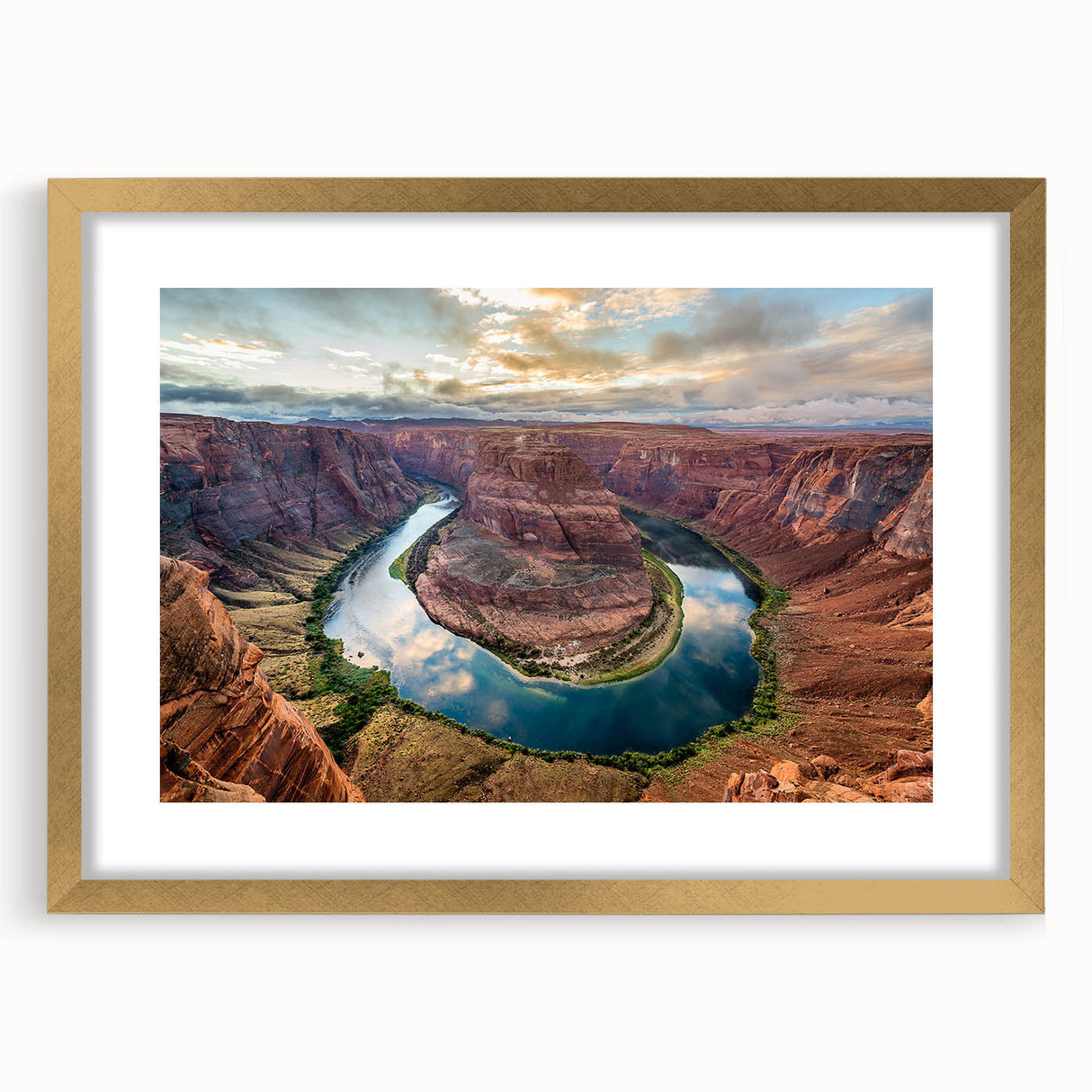 Framed wall art depicting a stunning canyon landscape with vibrant colors and intricate details, featuring a gold mat and sleek frame, perfect for home decor.