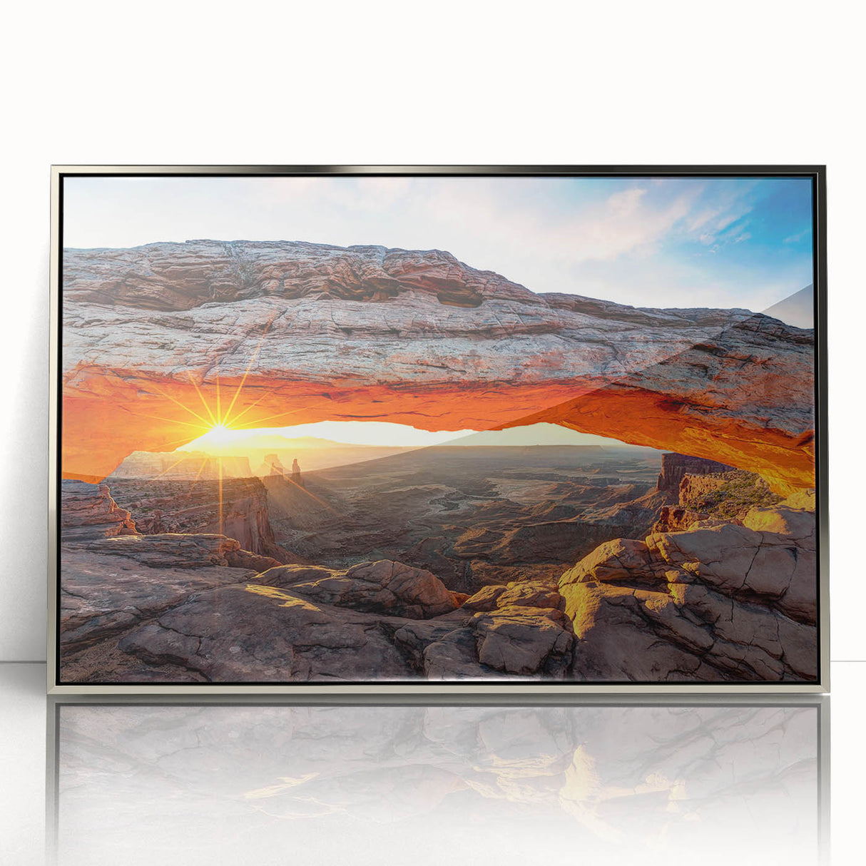 Framed acrylic wall art showcasing a striking canyon landscape design in silver tones, ideal for modern home decor and enhancing living spaces with natural beauty.