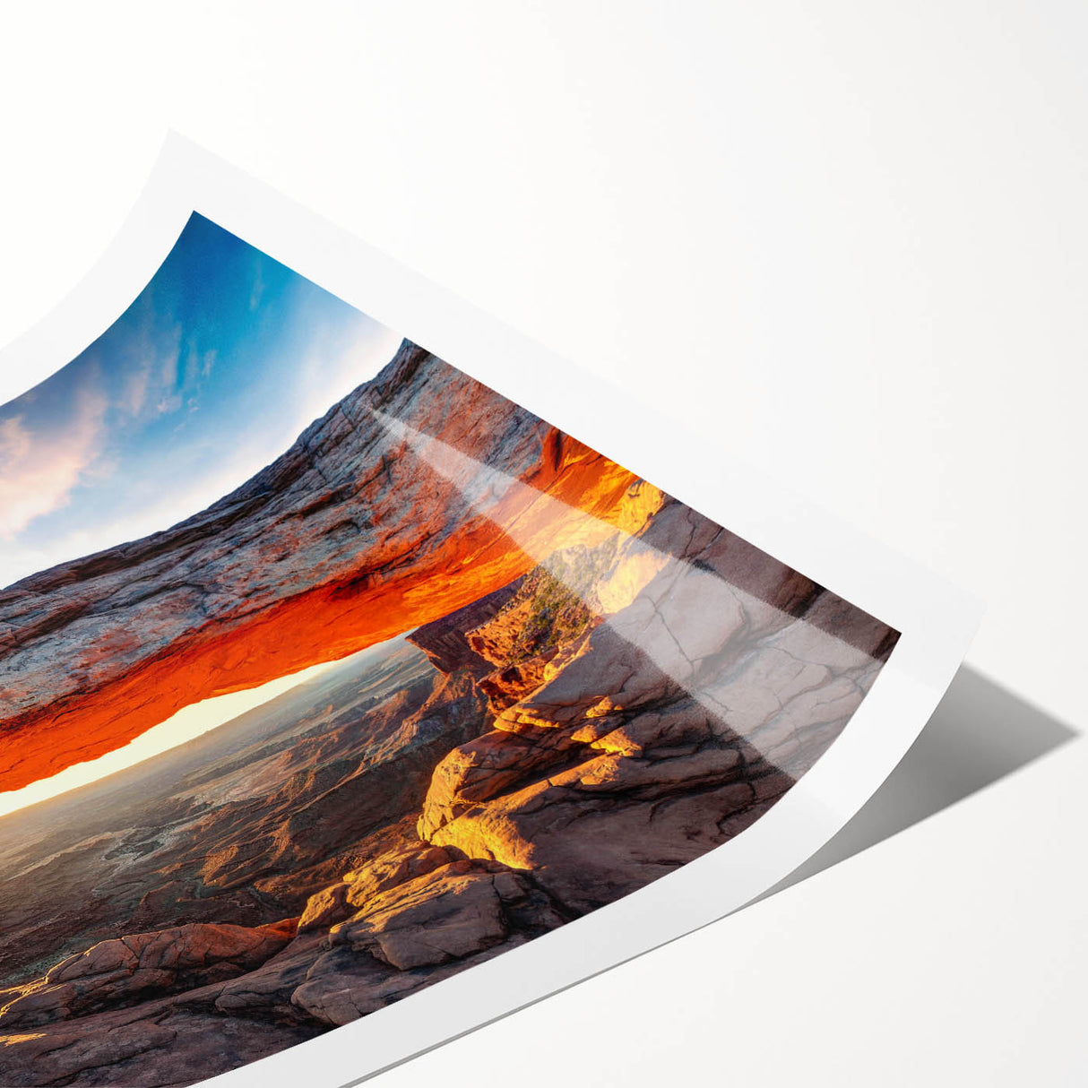 Vibrant rolled print showcasing a stunning canyon landscape with rich colors and intricate textures, perfect for enhancing any modern decor.