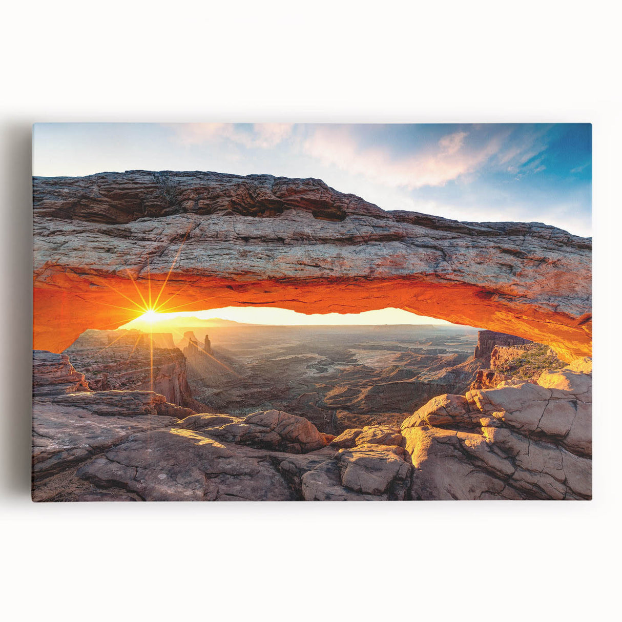 Vibrant stretched canvas artwork showcasing a stunning canyon landscape design, featuring rich earth tones and dramatic cliffs, perfect for enhancing home decor.