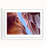 Framed wall art featuring a stunning canyon landscape design, showcased with a white mat and sleek frame, perfect for home decor and nature enthusiasts.