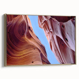 Elegant framed canvas wall art showcasing a stunning landscape of canyons with rich gold accents, ideal for modern home decor. This artwork adds a touch of sophistication and warmth to any space.