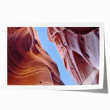 Vibrant rolled print showcasing a stunning canyon landscape in warm hues, perfect for wall decor. Ideal for nature lovers seeking unique home accents.