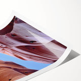 Vibrant landscape canyon wall art print showcasing rich earth tones and intricate details, rolled for easy framing and display in home decor settings.