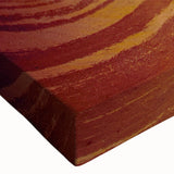 Close-up of a stretched canvas wall art piece depicting a vibrant canyon landscape, showcasing rich colors and intricate textures, perfect for home decor. This artwork adds a touch of natural beauty and adventure to any space, ideal for art enthusiasts and nature lovers.