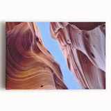 Vibrant stretched canvas artwork showcasing a stunning canyon landscape, featuring rich earthy tones and intricate details, perfect for enhancing home decor aesthetics.