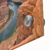 Close-up view of a vibrant acrylic glass wall art piece showcasing a stunning canyon landscape design with rich colors and intricate details, perfect for home décor.