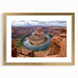 Framed wall art showcasing a stunning canyon landscape design with a gold mat, perfect for home decor, adding elegance and natural beauty to any space.
