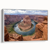 Framed canvas wall art showcasing a stunning canyon landscape design with warm earthy tones, perfect for adding a natural touch to home decor.