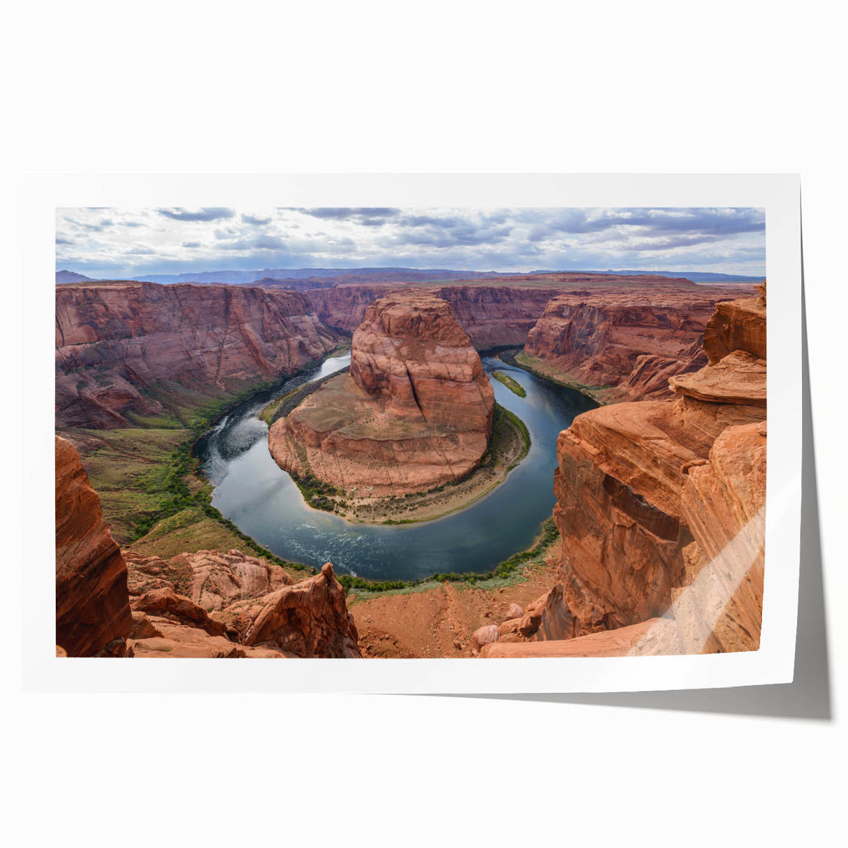 Vibrant rolled print of a stunning canyon landscape wall art design, showcasing rich colors and intricate details, ideal for home decor. Packaged securely in a cardboard tube for delivery.