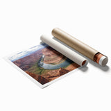 Vibrant rolled print of a canyon landscape, showcasing rich colors and intricate details, ideal for home decor or art collection, presented in a protective tube.