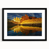 Framed wall art featuring a stunning landscape canyon design, showcasing vibrant colors and intricate details, presented in a sleek black frame with a white mat. Perfect for enhancing home decor and adding a touch of nature-inspired elegance.