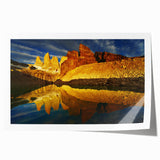 Stunning rolled print of a canyon landscape design showcasing vibrant hues of orange and blue, ideal for modern home decor. Perfect for art enthusiasts.