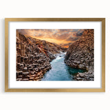 Framed gold wall art featuring a stunning canyon landscape design with a mat, perfect for enhancing home decor and adding a touch of elegance.