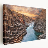 Stretched canvas wall art showcasing a stunning canyon landscape with vibrant earthy tones and intricate details, perfect for enhancing home décor and creating a serene atmosphere.