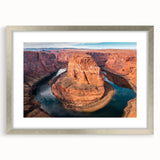 Framed wall art showcasing a stunning canyon landscape design with a silver mat and frame, ideal for modern home decor and nature enthusiasts.