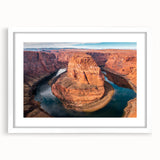 Framed wall art featuring a stunning canyon landscape design, with a white mat and sleek frame, perfect for home decor. Ideal for nature enthusiasts and interior design lovers.