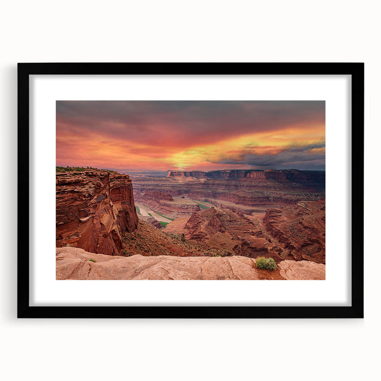Framed wall art featuring a stunning canyon landscape design, with a sleek black frame and white mat, perfect for modern home decor. Ideal for nature enthusiasts and interior design lovers seeking to enhance their living space.
