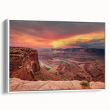 Framed canvas wall art showcasing a breathtaking canyon landscape design with vibrant colors, set against a white background, perfect for enhancing modern decor.