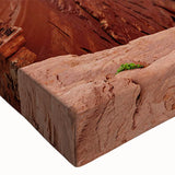 Close-up of a stretched canvas wall art piece showcasing a vibrant canyon landscape design, featuring rich earthy tones and intricate details, ideal for home decor.