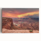 Stretched canvas artwork showcasing a vibrant canyon landscape with rich colors and intricate details, perfect for home decor or art collection.