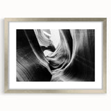 Framed wall art featuring a stunning canyon landscape design, with silver matting and a sleek frame, perfect for enhancing home decor in modern settings.