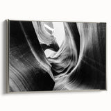 Framed canvas wall art showcasing a stunning canyon landscape with vibrant colors, featuring a silver frame that enhances the artwork's depth and elegance. Ideal for home decor enthusiasts looking to add a touch of nature-inspired beauty to their space.