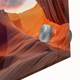 Close-up of a vibrant acrylic glass wall art piece showcasing a stunning canyon landscape design, featuring rich earth tones and intricate details, ideal for modern home decor.