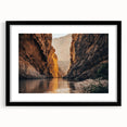 Framed black wall art showcasing a stunning canyon landscape design in a matte finish, perfect for home decor and modern interior styling.