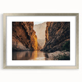 Framed landscape wall art featuring a striking canyon design in silver matting, showcasing vibrant colors and intricate details, perfect for modern decor.