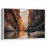 Framed canvas wall art showcasing a stunning canyon landscape design with vibrant colors and intricate details, ideal for enhancing home decor and creating a serene atmosphere.