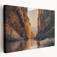 Stretched canvas wall art showcasing a stunning canyon landscape with vibrant earthy tones, expertly designed for modern home decor, ideal for enhancing interior aesthetics.