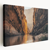 Stretched canvas wall art showcasing a stunning canyon landscape with vibrant earthy tones, expertly designed for modern home decor, ideal for enhancing interior aesthetics.