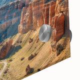 Close-up of a vibrant acrylic landscape wall art piece showcasing a stunning canyon design, featuring rich colors and intricate details, perfect for modern decor.