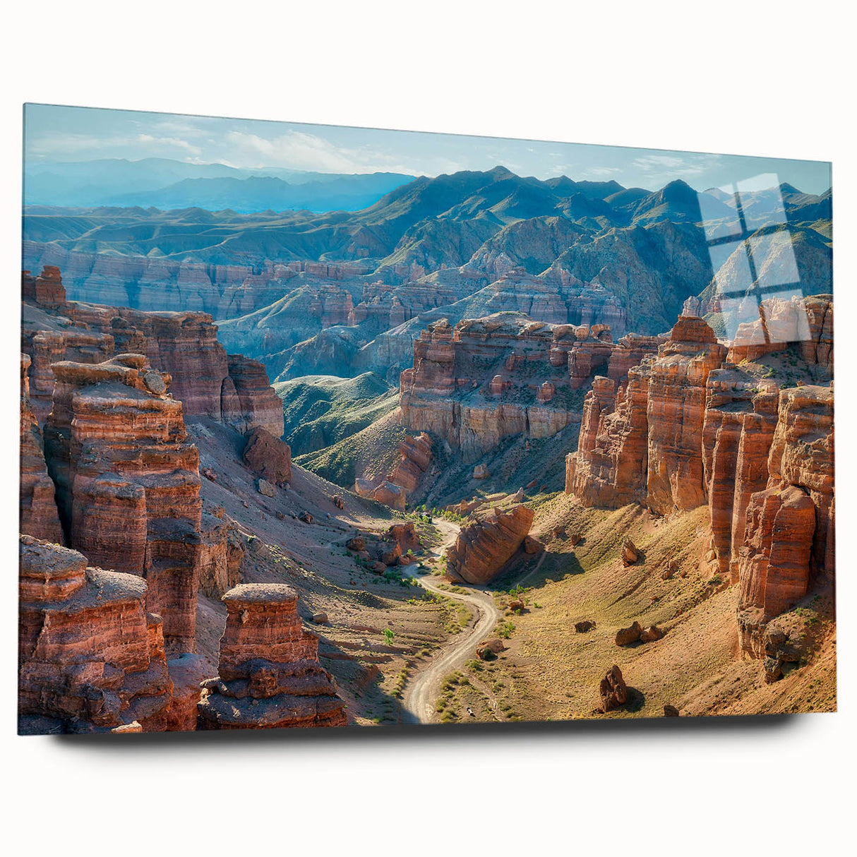 Acrylic glass wall art collection showcasing a stunning canyon landscape design with vibrant colors, viewed from the side and elegantly displayed without pins.