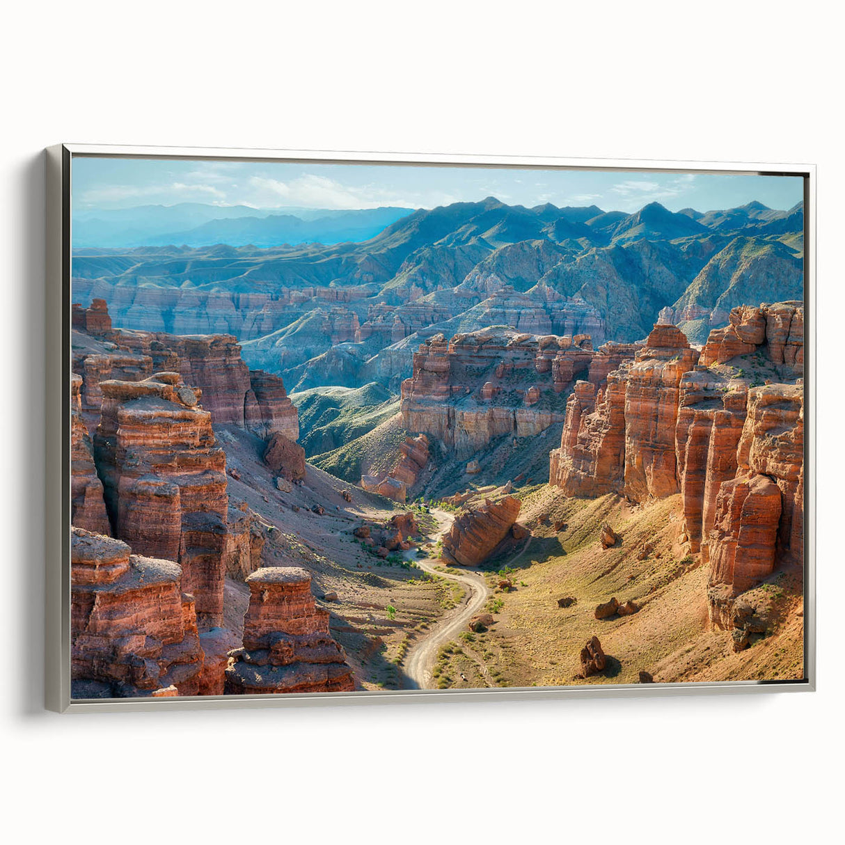 Framed silver canvas wall art showcasing a stunning landscape of canyons with rich color gradients, ideal for enhancing modern home decor. Perfect for nature lovers.
