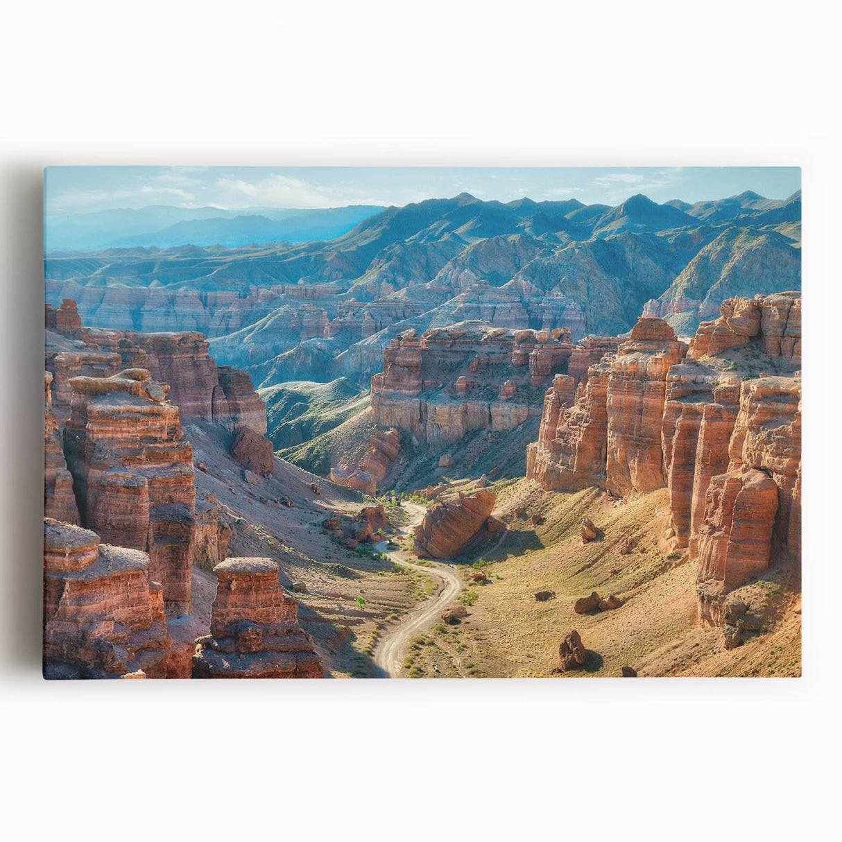 Stretched canvas wall art showcasing a stunning landscape of canyons in warm earth tones, ideal for enhancing modern home decor and creating a serene atmosphere.