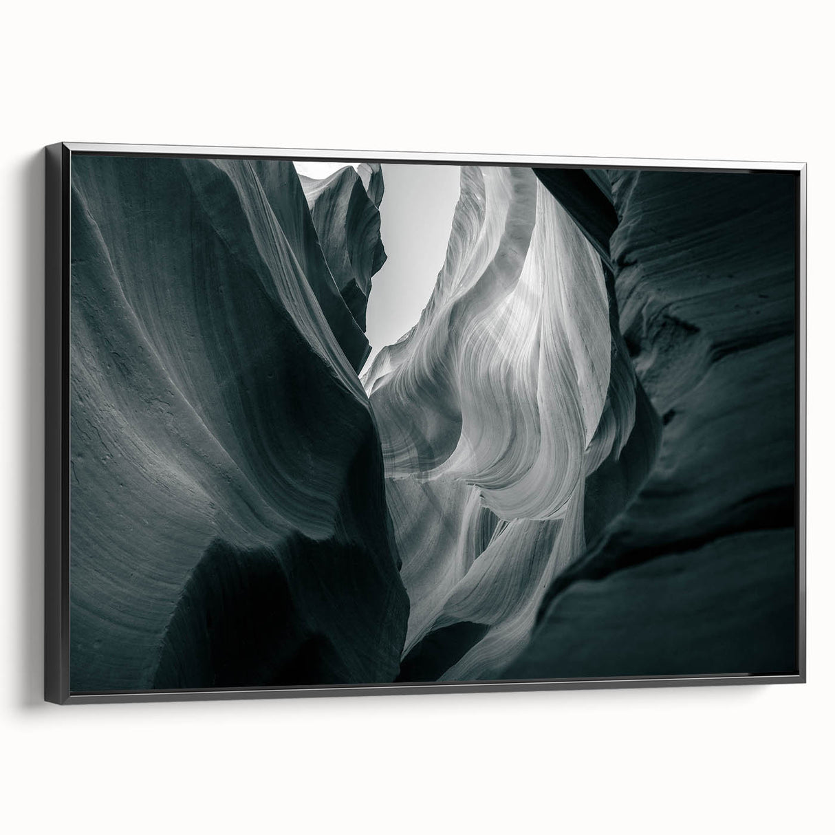 Framed canvas wall art showcasing a stunning canyon landscape design, featuring rich earthy tones and intricate details, viewed from a side angle against a neutral backdrop.