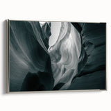 Framed canvas wall art showcasing a stunning canyon landscape design in rich earth tones, elegantly displayed with a silver frame, ideal for home decor.