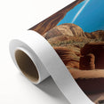 Vibrant rolled canvas showcasing a colorful canyon landscape design, perfect for home decor, displayed against a neutral background for emphasis.