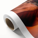 Stunning rolled canvas wall art featuring a vibrant canyon landscape design, showcasing rich colors and textures, perfect for home decor. Packaged securely for delivery.