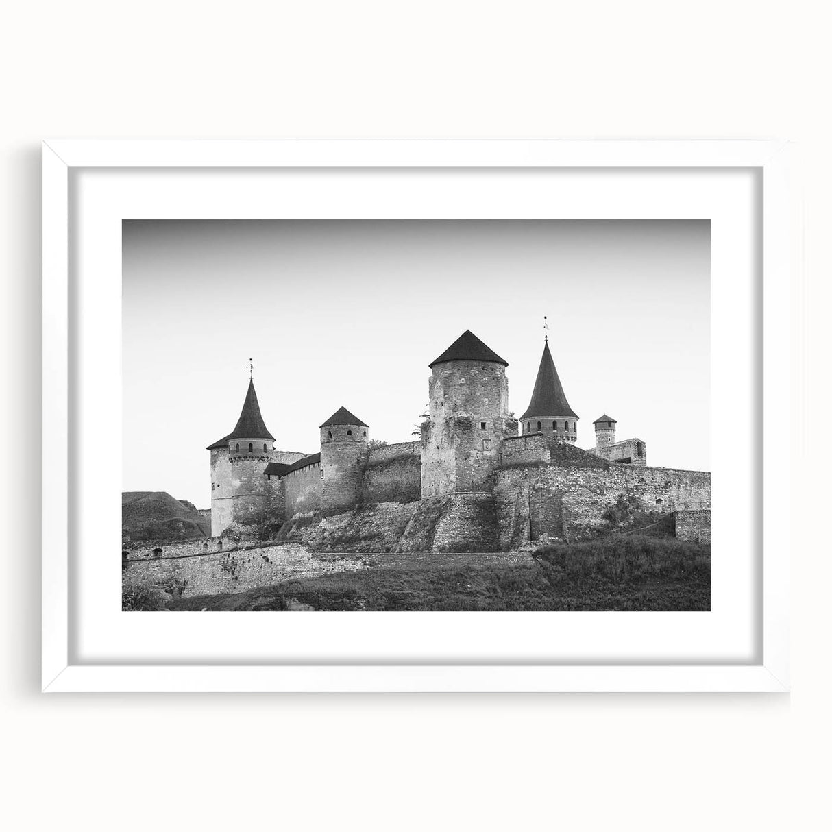 Elegant white-framed wall art showcasing a stunning landscape with a castle, designed to enhance home decor. Ideal for adding a touch of sophistication to any room.