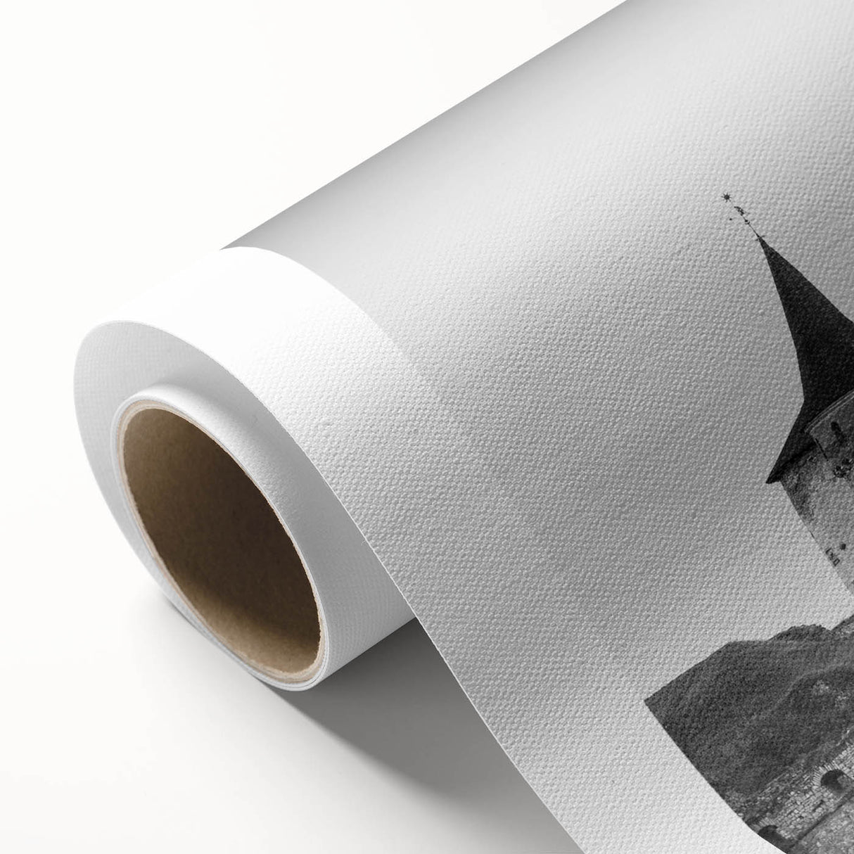 Rolled canvas showcasing a stunning landscape design featuring a majestic castle surrounded by lush greenery, ideal for home decor and artistic display.