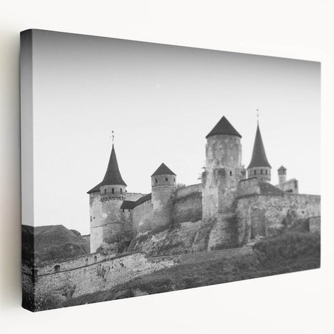 Stretched canvas wall art showcasing a picturesque landscape with a majestic castle, framed in a side view, ideal for home decor and interior design enthusiasts.